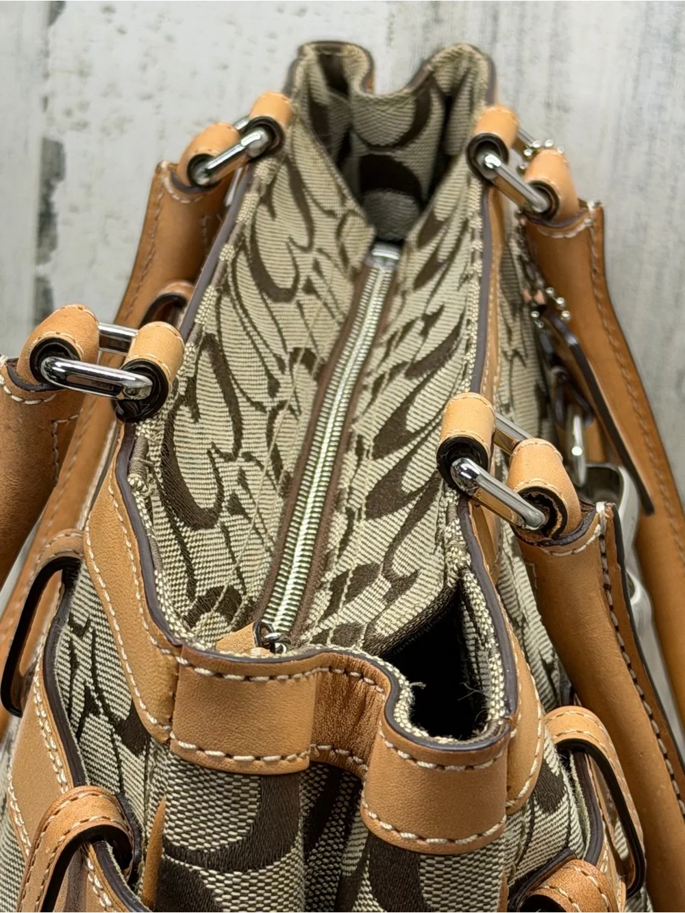 Coach iconic signature